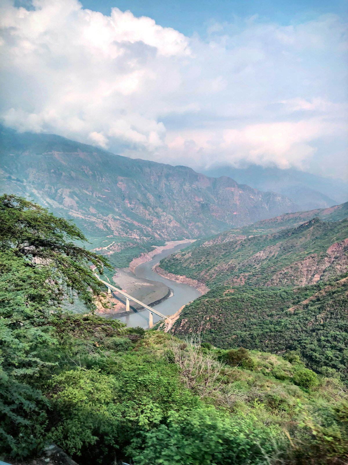 Chicamocha Canyon river winding through dramatic red mountains, Santander, Colombia