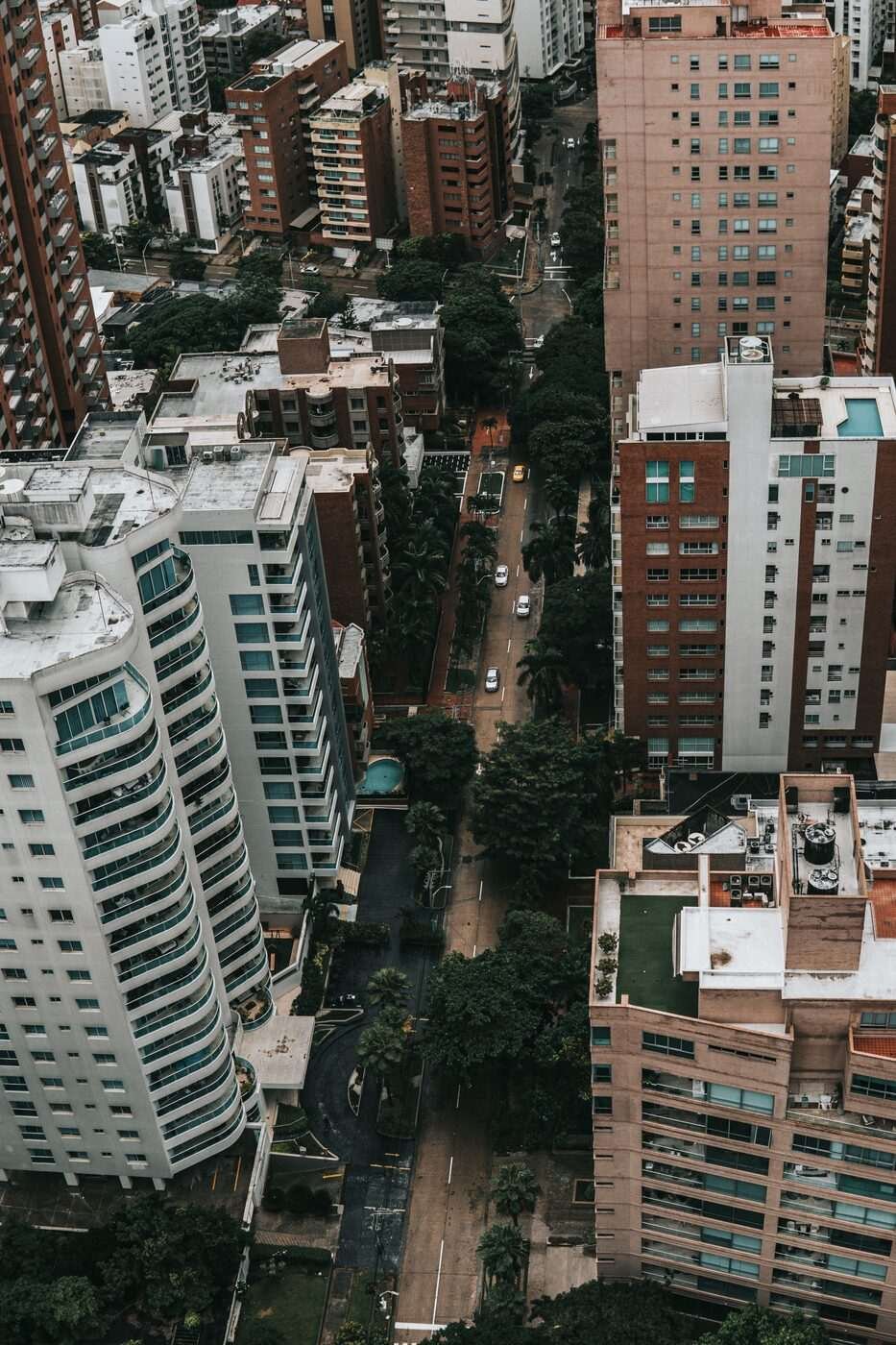 Aerial view of Barranquilla hotel district with apartment towers and tree-lined streets, Colombia