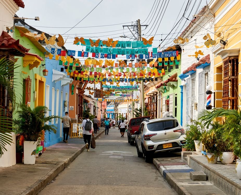 Colourful street in Getsemaní, Cartagena, decorated with festival bunting for celebrations
