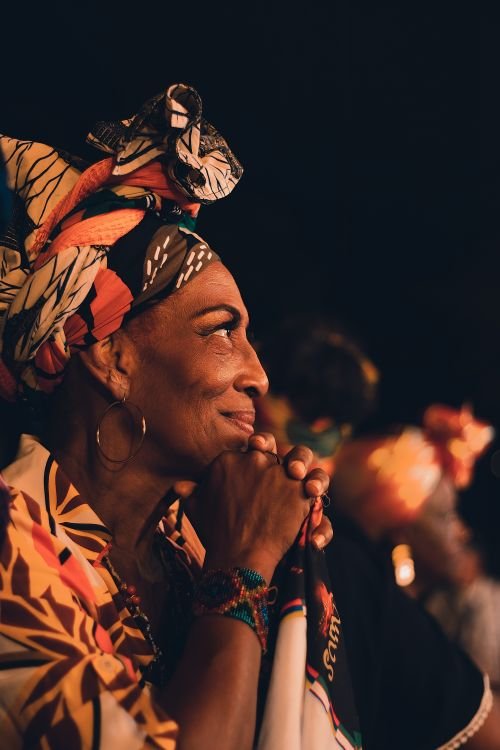 Woman in traditional attire at a Cali cultural event during Feria de Cali