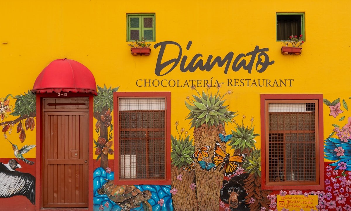 Colourful painted mural on a restaurant facade in Bogota's La Candelaria neighbourhood