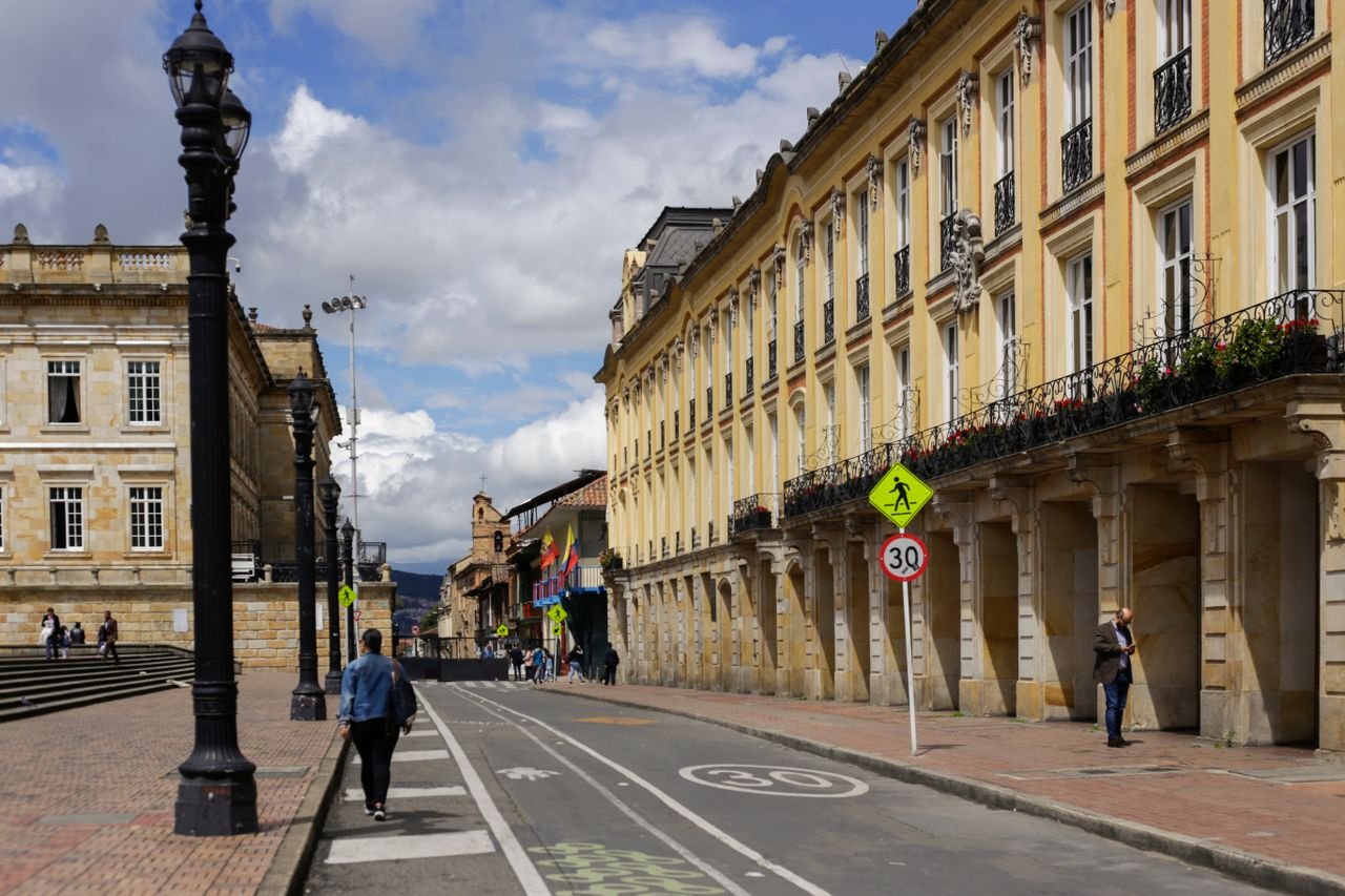 Colonial buildings and a street lamp near Plaza de Bolivar in La Candelaria, Bogota