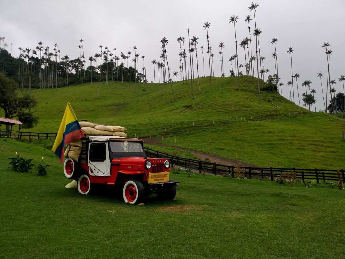 Willys jeep parked on a street in Salento, Colombia