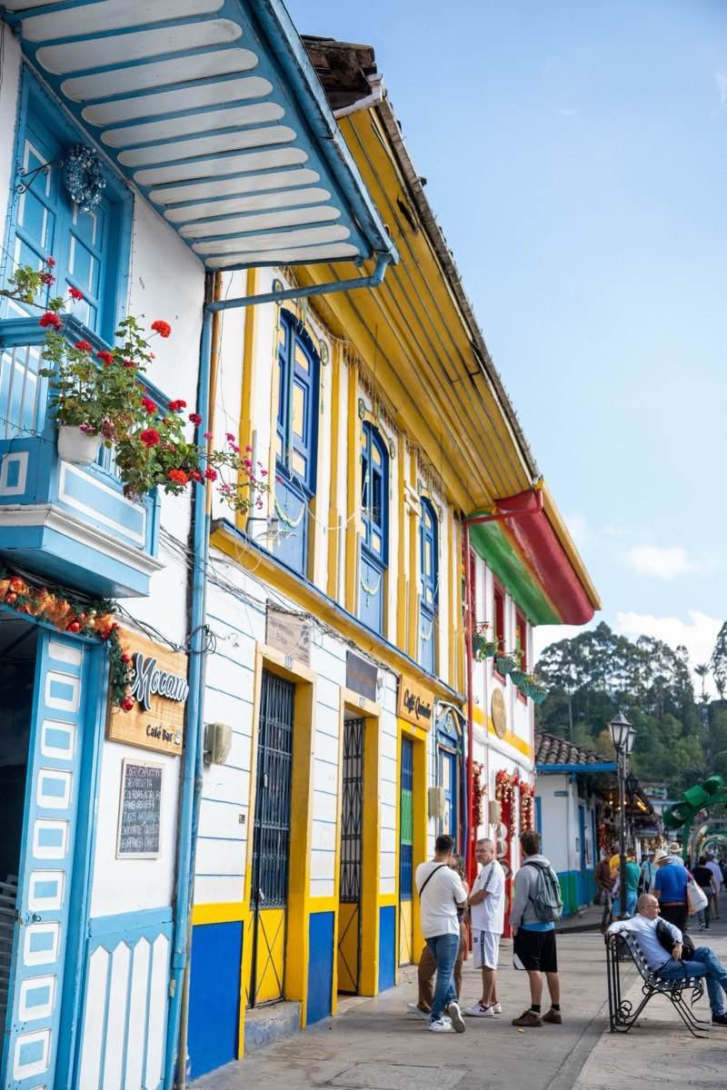 Colourful balconied house fronts on a street in Salento, Colombia