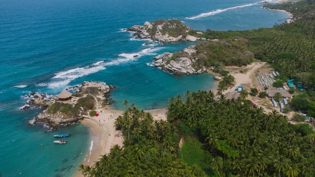 Aerial view of rocky headlands and sandy coves in Tayrona National Park