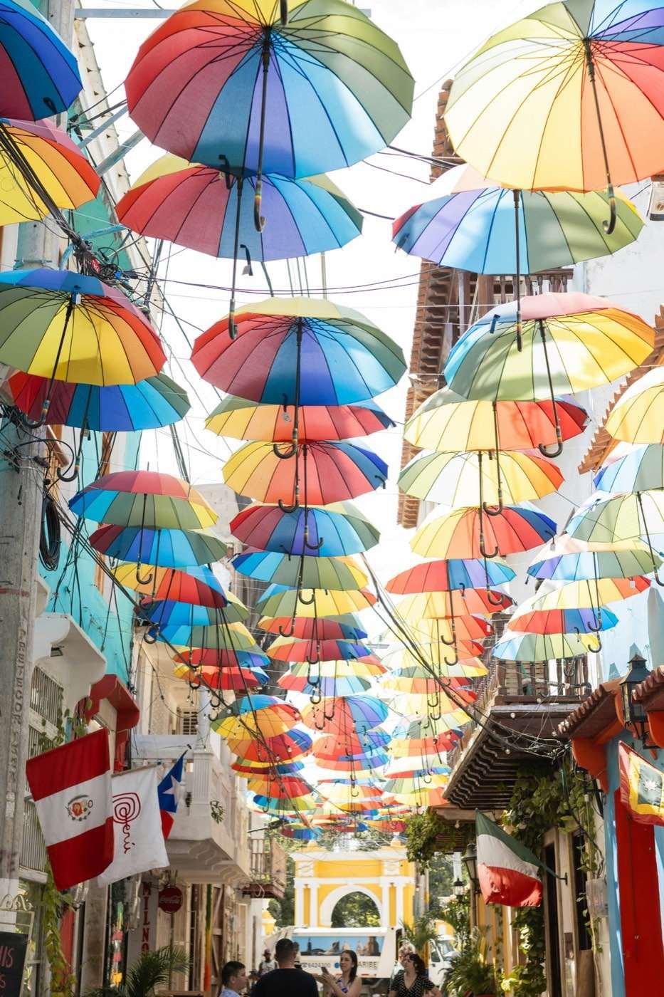 Colourful umbrella installation above a street in Cartagena's old town, Colombia