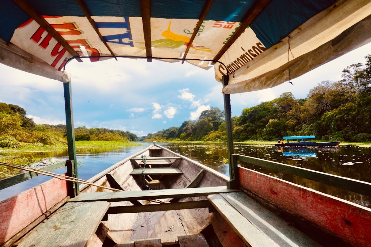 Wooden boat on the Amazon river near Puerto Nariño, Colombia - a region where yellow fever and malaria precautions apply