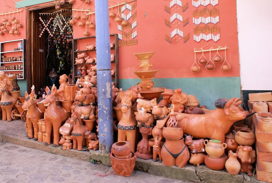 Colourful pottery and ceramics displayed outside shops in Ráquira village, Boyacá, Colombia