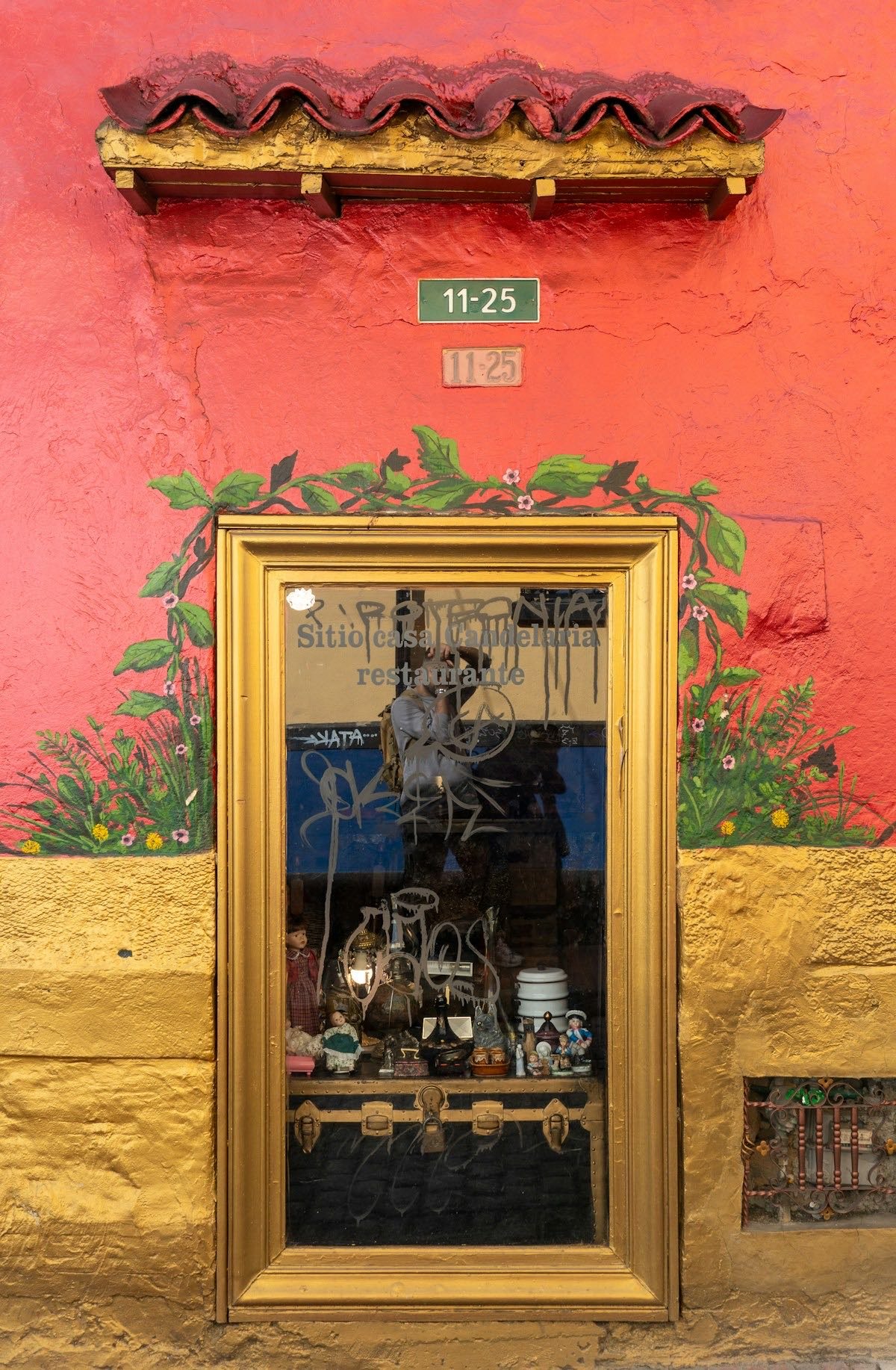 Colourful storefront of a restaurant or cafe on a Bogota street, Colombia